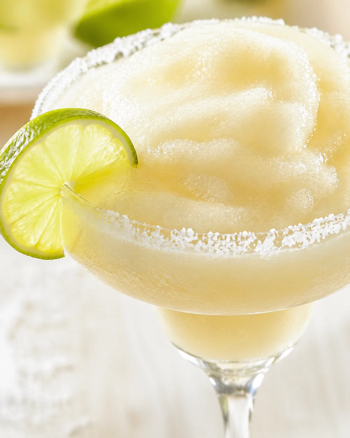 Final plated How to Make Frozen Margaritas at Home - So Easy! served as a hero shot