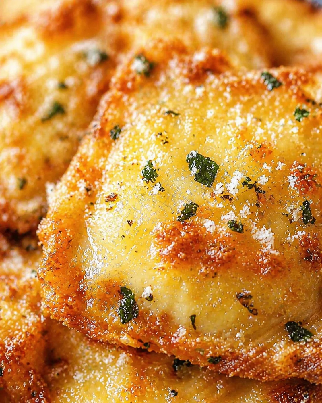 Tight detail shot of Baked Crispy Parmesan Ravioli: Your Irresistible Snack Delight highlighting texture