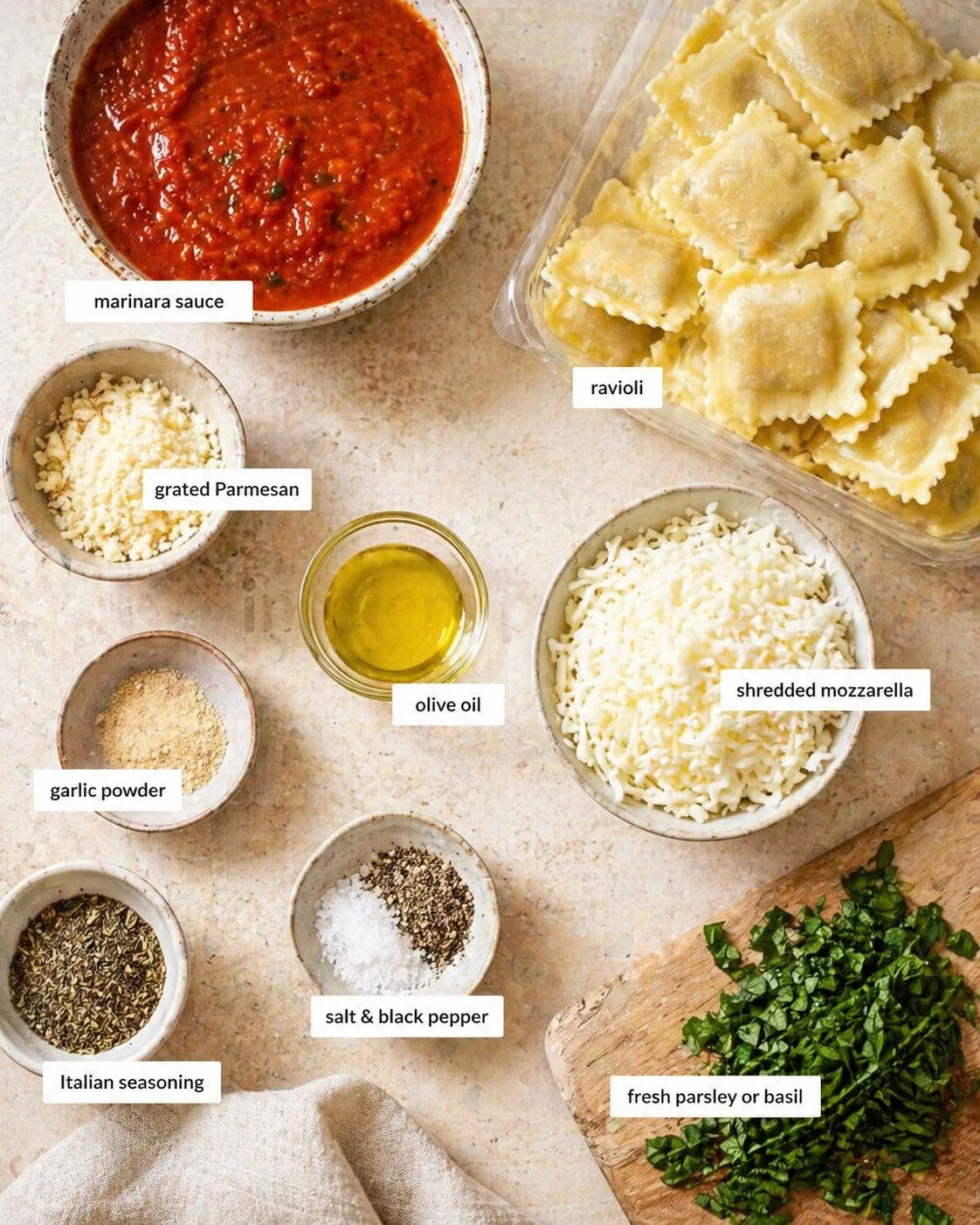 ingredients-placeholder.png Measured ingredients arranged for Baked Ravioli: 1 (20–25 oz) package of refrigerated or frozen ravioli (cheese-filled works like a charm—but try spinach, meat, or mushrooms if you want to mix it up), 2 cups marinara sau