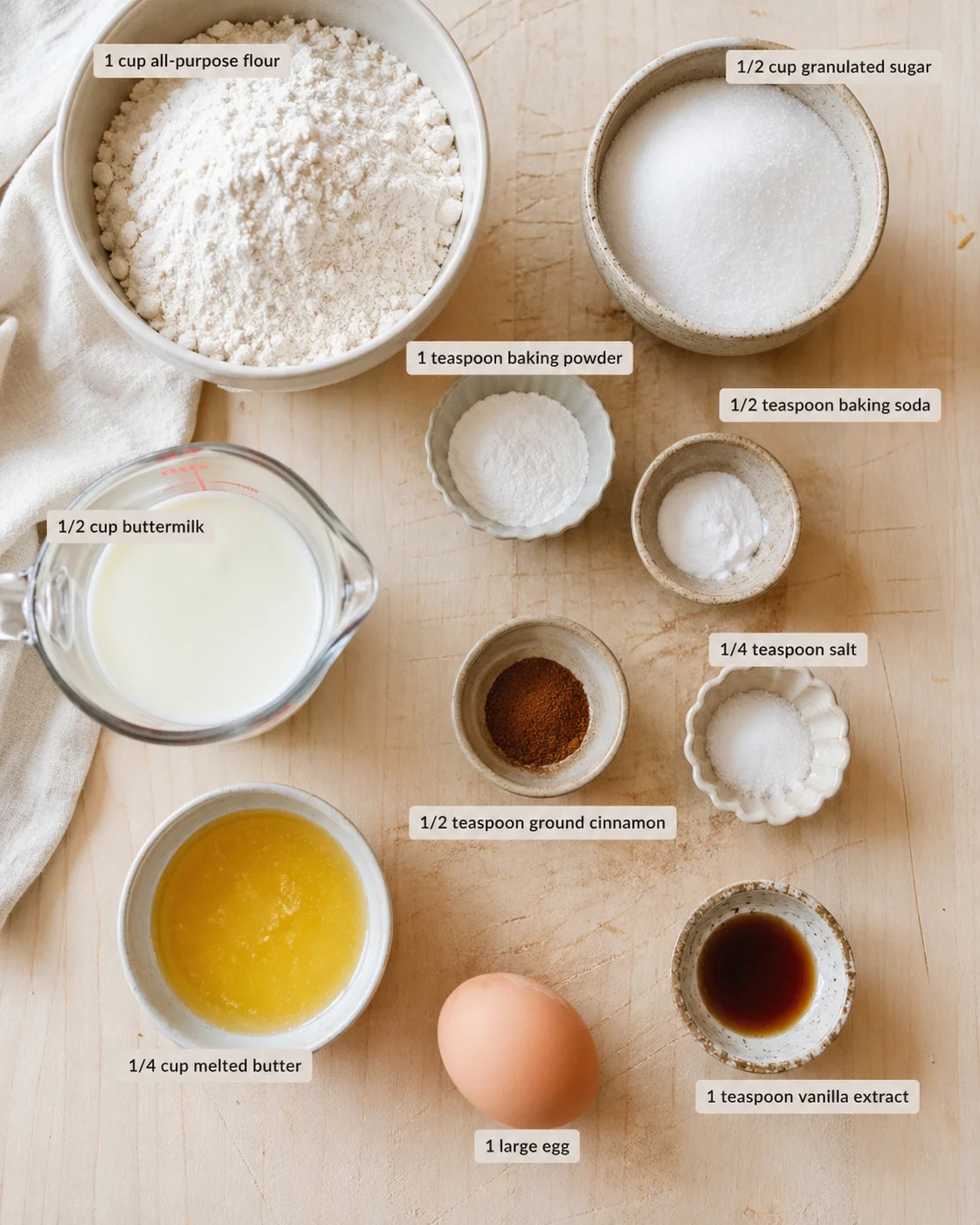 ingredients-placeholder.png Measured ingredients arranged for Homemade Baked Donuts: 1 cup all-purpose flour, 1/2 cup granulated sugar, 1 teaspoon baking powder, 1/2 teaspoon baking soda, 1/4 teaspoon salt, 1/2 teaspoon ground cinnamon (optional, b