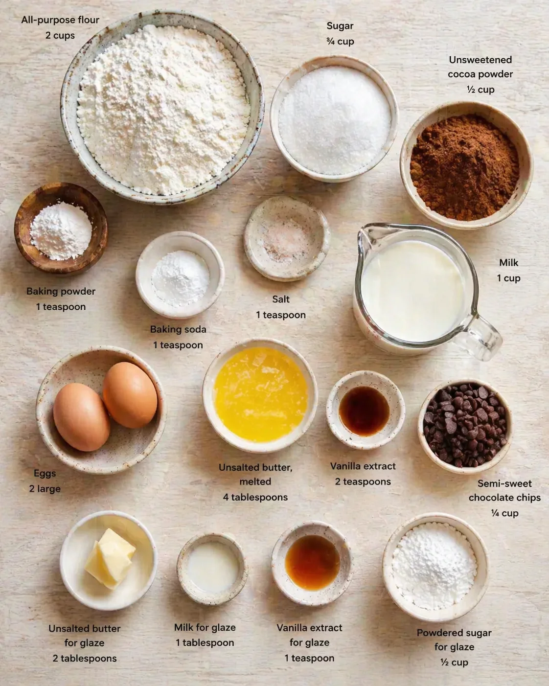 top-down view of baking ingredients labeled with amounts on a wooden surface