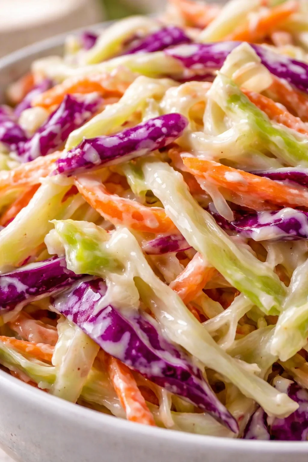 closing_final_dish-placeholder.png Tight detail shot of Best Coleslaw Dressing for Pulled Pork highlighting texture