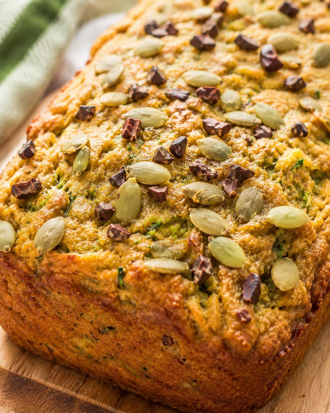 Gluten-Free Coconut Zucchini Bread Moist, gluten-free zucchini bread topped with seeds and chocolate chunks.