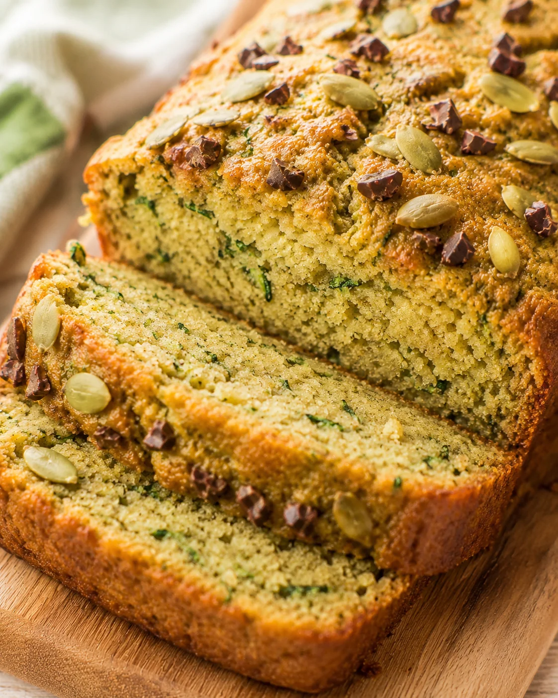Gluten-Free Coconut Zucchini Bread Moist, lightly sweet zucchini bread topped with pumpkin seeds and chocolate chips.