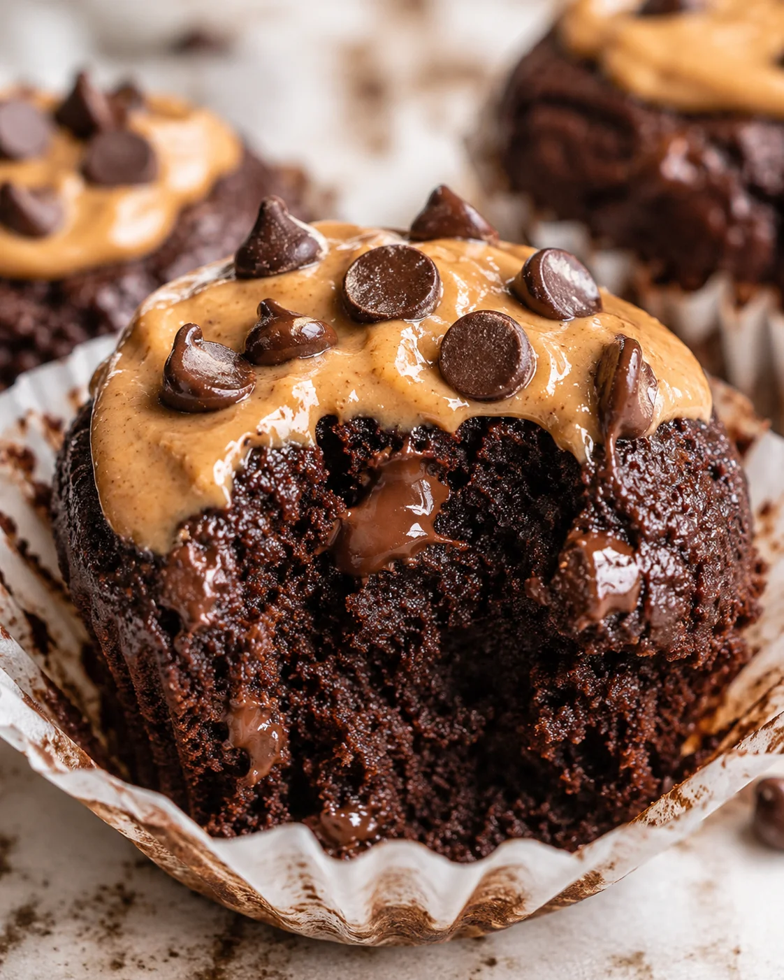 Chocolate Zucchini Muffins Moist, fluffy gluten-free chocolate zucchini muffin with chocolate chips on top