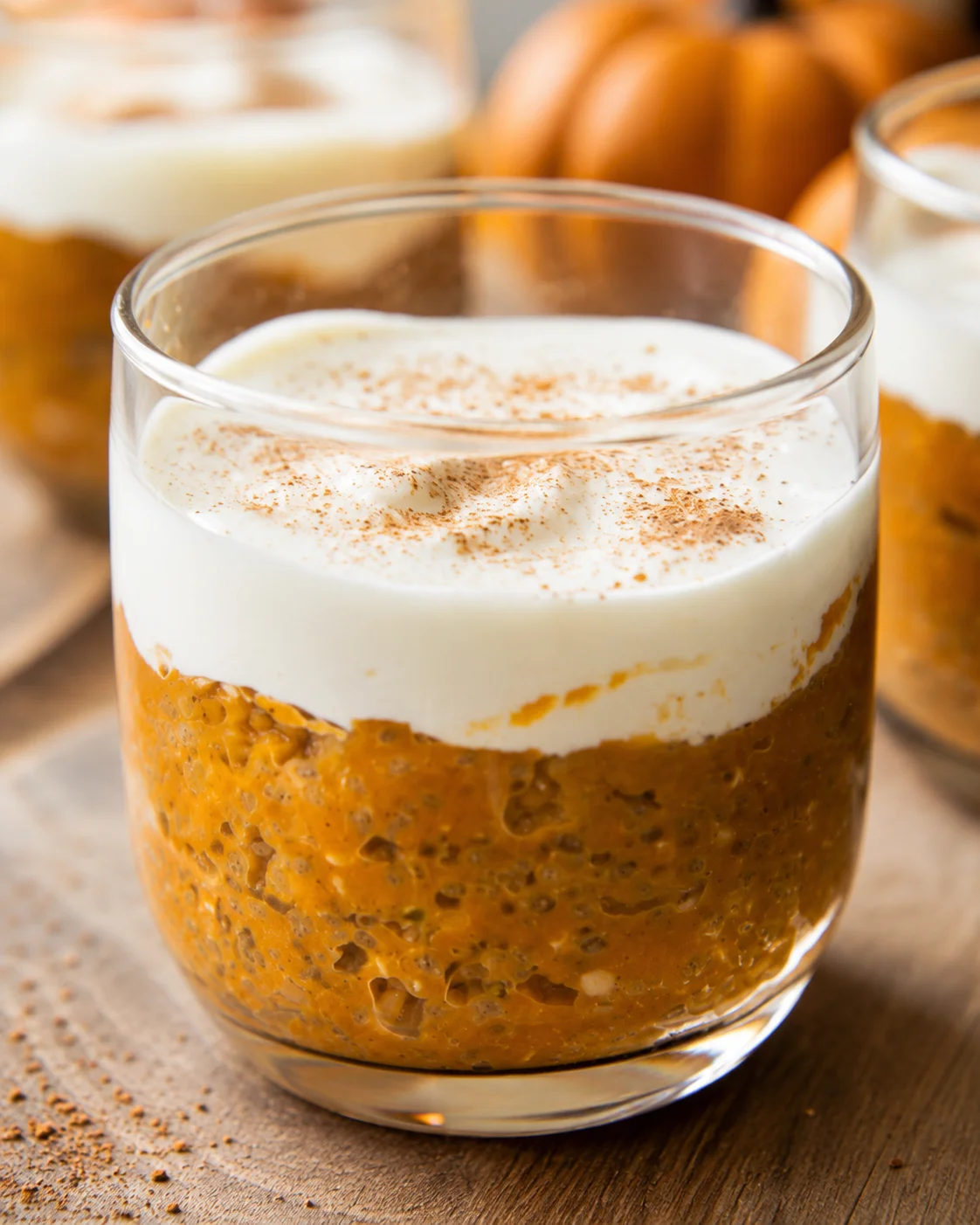 High Protein Pumpkin Chia Pudding Creamy pumpkin chia pudding topped with whipped yogurt and a sprinkle of cinnamon.